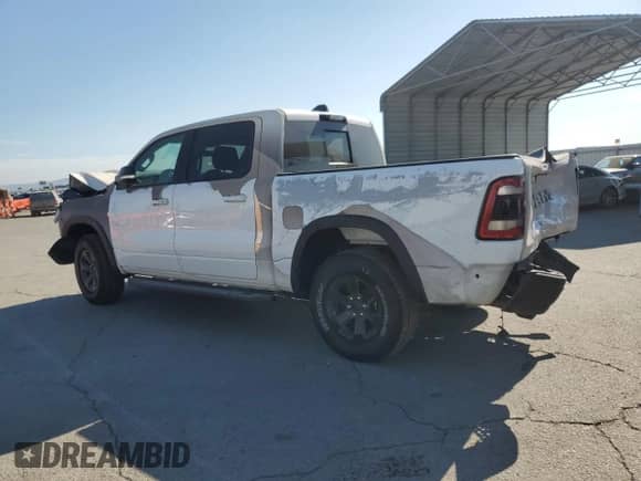 2022 Ram 1500 Rebel z VIN 1C6SRFLT3NN168756, wystawiony jako Copart lot #66036665 z przebiegiem 52 963 mil mil oraz Szkoda całkowita • Salvage title. Historia ofert i sprzedaży dostępna na DreamBid. Obrazek 2.