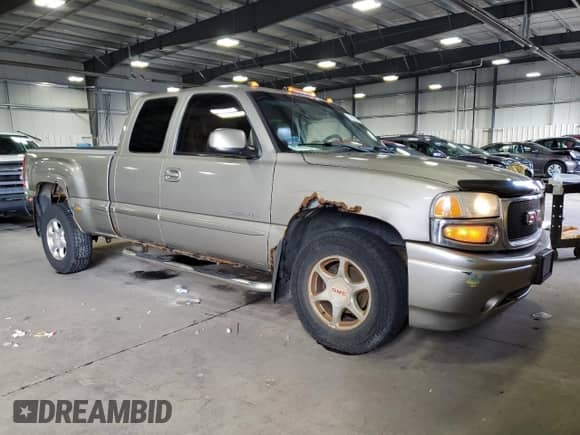 2002 GMC Sierra 1500 Denali z VIN 2GTFK69U021173036, wystawiony jako Copart lot #51416215 z przebiegiem 316 034 mil mil oraz Szkoda całkowita • Salvage title. Historia ofert i sprzedaży dostępna na DreamBid. Obrazek 4.