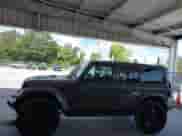 2023 Jeep Wrangler Sahara Altitude with VIN 1C4HJXEG0PW558839, listed as a IAAI auction lot 43001327 with 16,845 mi miles and . Bid and sale history available at DreamBid. Image 14.