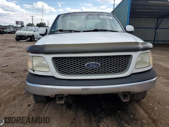 2000 Ford F-150 XL z VIN 1FTRX17W7YNC12430, wystawiony jako Copart lot #66036385 z przebiegiem Nie podano mil oraz Nie do naprawy • Non repairable. Historia ofert i sprzedaży dostępna na DreamBid. Obrazek 5.