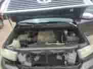 2012 Toyota Tundra Limited z VIN 5TFSY5F10CX132864, wystawiony jako Copart lot #70156505 z przebiegiem 186 395 mil mil oraz Szkoda całkowita • Salvage title. Historia ofert i sprzedaży dostępna na DreamBid. Obrazek 11.