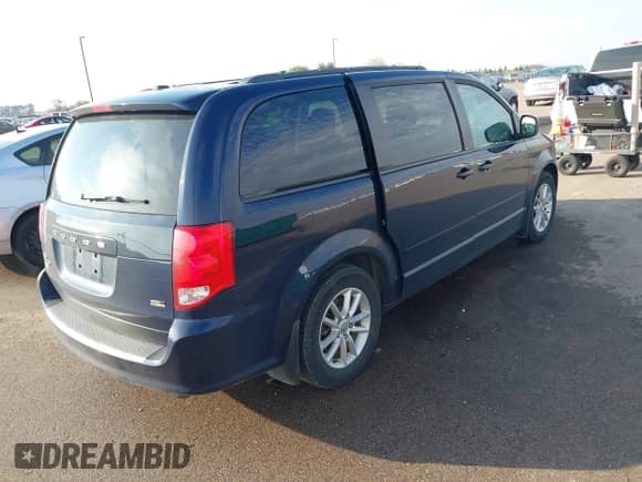 2013 Dodge Grand Caravan SXT with VIN 2C4RDGCG3DR582958, listed as a IAAI auction lot 43477454 with 132,299 mi miles and . Bid and sale history available at DreamBid. Image 4.