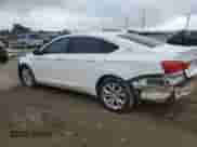 2018 Chevrolet Impala LT с VIN 1G1105SAXJU135951, выставлен на аукционе Copart как лот 70464815 с пробегом 153 582 миль миль и Списание • Salvage title. История ставок и продаж доступна на DreamBid. Изображение 2.