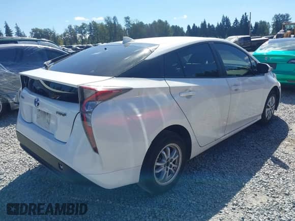 2016 Toyota Prius Two Eco z VIN JTDKARFU4G3006106, wystawiony jako IAAI lot #42967872 z przebiegiem 132 493 mil mil oraz . Historia ofert i sprzedaży dostępna na DreamBid. Obrazek 4.