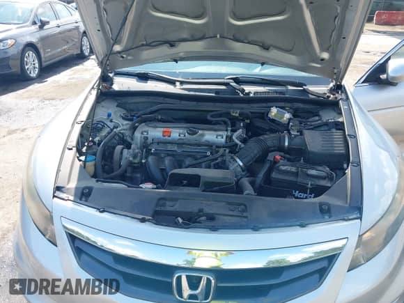 2012 Honda Accord LX-S with VIN 1HGCS1B32CA012977, listed as a IAAI auction lot 42952252 with 94,964 mi miles and . Bid and sale history available at DreamBid. Image 10.