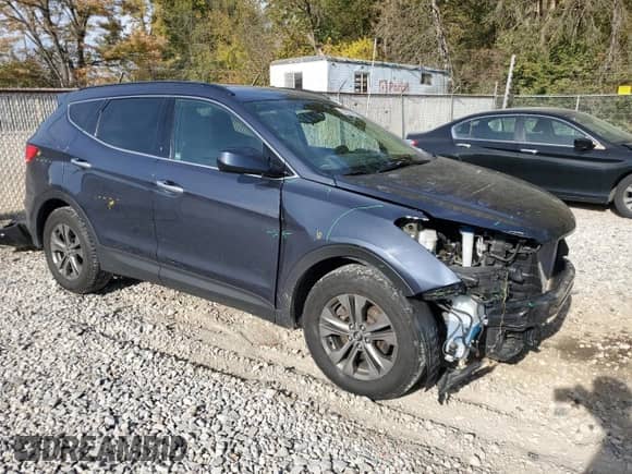 2014 Hyundai Santa Fe z VIN 5XYZUDLB7EG177484, wystawiony jako Copart lot #82601495 z przebiegiem 101 832 mil mil oraz Szkoda całkowita • Salvage title. Historia ofert i sprzedaży dostępna na DreamBid. Obrazek 4.