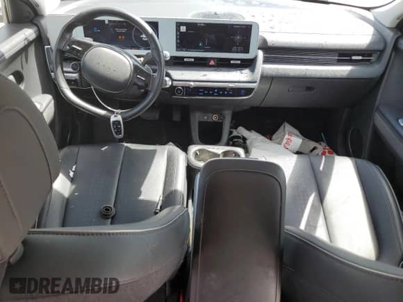 2022 Hyundai Ioniq 5 SEL с VIN KM8KN4AE7NU115282, выставлен на аукционе Copart как лот 84834325 с пробегом 28 939 миль миль и На запчасти • Non repairable. История ставок и продаж доступна на DreamBid. Изображение 8.