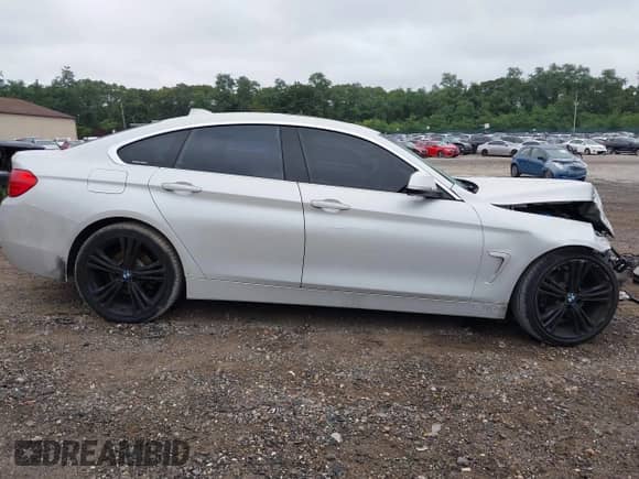 2017 BMW 4 Series 430i with VIN WBA4F7C5XHG787510, listed as a IAAI auction lot 43036039 with 134,982 mi miles and . Bid and sale history available at DreamBid. Image 14.
