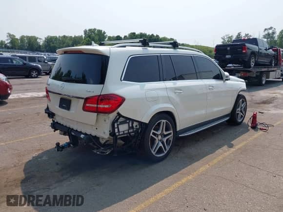 2017 Mercedes-Benz GLS 550 with VIN 4JGDF7DE4HA879647, listed as a IAAI auction lot 39999023 with 97,372 mi miles and . Bid and sale history available at DreamBid. Image 4.