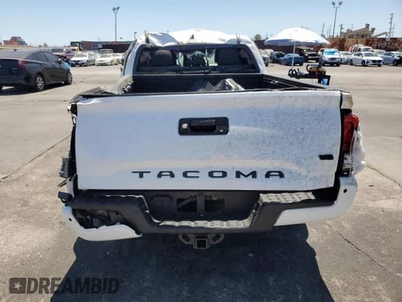 2020 Toyota Tacoma SR5 с VIN 3TMBZ5DN2LM026277, выставлен на аукционе Copart как лот 69490725 с пробегом 52 492 миль миль и Списание • Salvage title. История ставок и продаж доступна на DreamBid. Изображение 6.