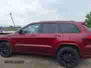 2020 Jeep Grand Cherokee Altitude with VIN 1C4RJFAG0LC233091, listed as a IAAI auction lot 42706976 with 66,255 mi miles and . Bid and sale history available at DreamBid. Image 14.