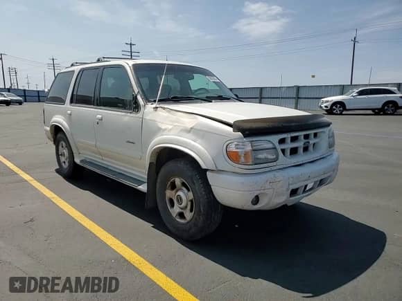 1999 Ford Explorer XLT with VIN 1FMZU34E1XZA28197, listed as a Copart auction lot 58852855 with 115,367 mi miles and Salvage title. Bid and sale history available at DreamBid. Image 15.