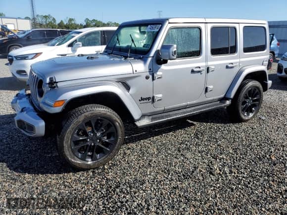 2021 Jeep Wrangler Unlimited Sahara High Altitude with VIN 1C4HJXEG5MW659306, listed as a Copart auction lot 74563914 with Not provided miles and Salvage title. Bid and sale history available at DreamBid. Image 1.