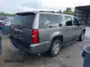 2007 Chevrolet Suburban LT with VIN 1GNFC16077R372737, listed as a IAAI auction lot 41917140 with 249,075 mi miles and . Bid and sale history available at DreamBid. Image 4.