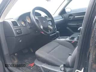 2010 Dodge Charger SXT с VIN 2B3CA3CV2AH107648, выставлен на аукционе IAAI как лот 43061592 с пробегом 151 524 миль миль и . История ставок и продаж доступна на DreamBid. Изображение 5.