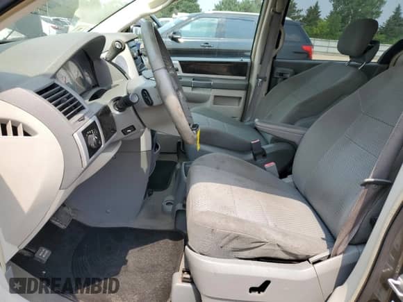 2010 Dodge Grand Caravan SXT с VIN 2D4RN5D11AR269031, выставлен на аукционе Copart как лот 67026245 с пробегом 142 710 миль миль и Списание • Salvage title. История ставок и продаж доступна на DreamBid. Изображение 7.