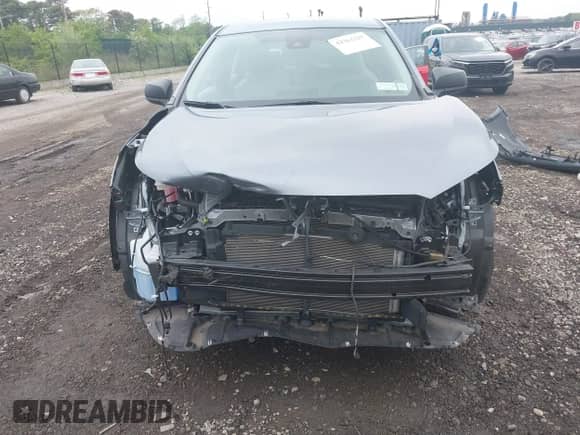 2022 Toyota Corolla Cross L with VIN 7MUAAABG0NV024424, listed as a IAAI auction lot 42261227 with 20,171 mi miles and . Bid and sale history available at DreamBid. Image 12.