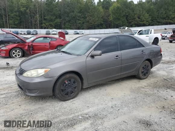2005 Toyota Camry STD с VIN 4T1BE32KX5U540297, выставлен на аукционе Copart как лот 81882295 с пробегом 212 090 миль миль и Списание • Salvage title. История ставок и продаж доступна на DreamBid. Изображение 1.