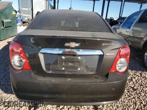 2016 Chevrolet Sonic LT с VIN 1G1JC5SB6G4158166, выставлен на аукционе Copart как лот 87756845 с пробегом 132 602 миль миль и Списание • Salvage title. История ставок и продаж доступна на DreamBid. Изображение 6.