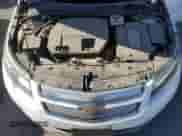 2014 Chevrolet Volt z VIN 1G1RE6E48EU166749, wystawiony jako Copart lot #64119745 z przebiegiem 179 324 mil mil oraz Szkoda całkowita • Salvage title. Historia ofert i sprzedaży dostępna na DreamBid. Obrazek 11.