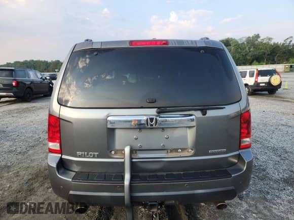 2009 Honda Pilot Touring with VIN 5FNYF38829B016406, listed as a Copart auction lot 71791575 with 221,923 mi miles and Salvage title. Bid and sale history available at DreamBid. Image 6.