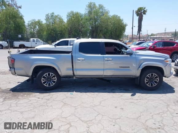 2020 Toyota Tacoma SR5 z VIN 3TMBZ5DN3LM025980, wystawiony jako IAAI lot #42215140 z przebiegiem 67 414 mil mil oraz . Historia ofert i sprzedaży dostępna na DreamBid. Obrazek 13.