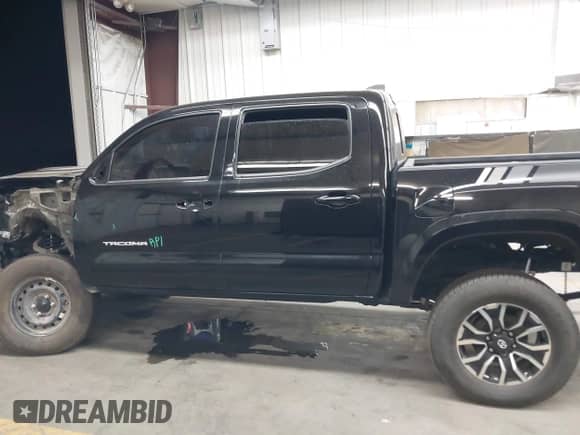 2023 Toyota Tacoma SR z VIN 3TMCZ5AN2PM574939, wystawiony jako IAAI lot #43279479 z przebiegiem 29 535 mil mil oraz . Historia ofert i sprzedaży dostępna na DreamBid. Obrazek 15.
