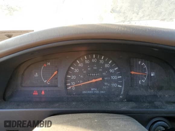 1997 Toyota Tacoma z VIN 4TAWM72N3VZ308584, wystawiony jako Copart lot #76939654 z przebiegiem 259 695 mil mil oraz Szkoda całkowita • Salvage title. Historia ofert i sprzedaży dostępna na DreamBid. Obrazek 9.