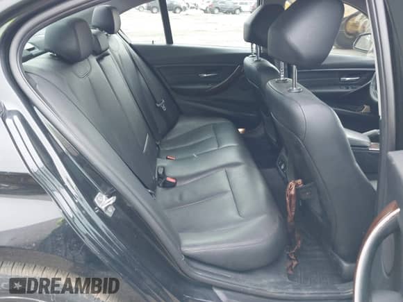 2016 BMW 3 Series 320i xDrive with VIN WBA8A3C54GK690632, listed as a IAAI auction lot 41637167 with 89,374 mi miles and . Bid and sale history available at DreamBid. Image 8.