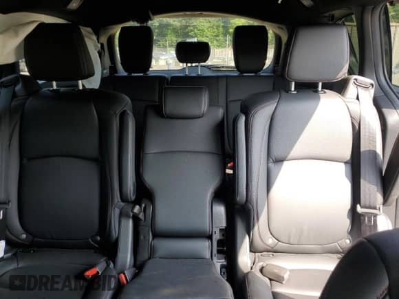 2025 Honda Odyssey Sport-L z VIN 5FNRL6H74SB049810, wystawiony jako Copart lot #65541675 z przebiegiem Nie podano mil oraz Nie do naprawy • Non repairable. Historia ofert i sprzedaży dostępna na DreamBid. Obrazek 10.