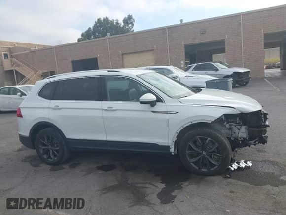 2022 Volkswagen Tiguan SE with VIN 3VV3B7AX2NM020185, listed as a IAAI auction lot 42956464 with 31,023 mi miles and . Bid and sale history available at DreamBid. Image 12.