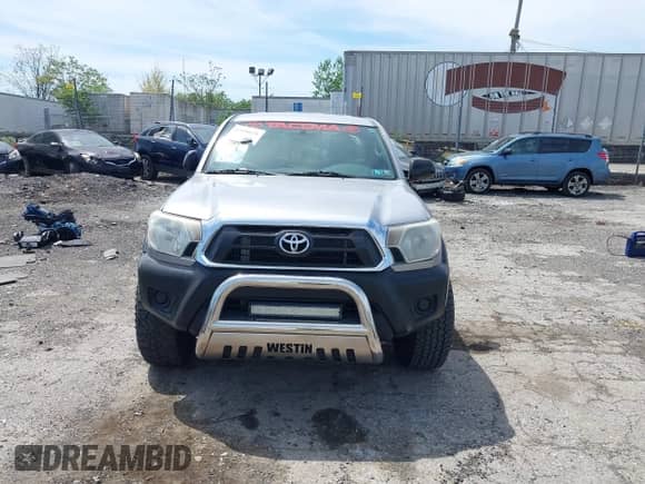 2014 Toyota Tacoma with VIN 5TFUX4EN0EX029652, listed as a IAAI auction lot 42150630 with 208,098 mi miles and . Bid and sale history available at DreamBid. Image 12.