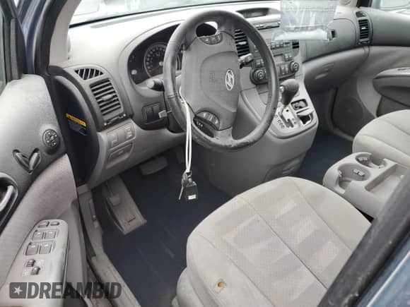 2008 Hyundai Entourage GLS with VIN KNDMC233386044562, listed as a Copart auction lot 74676734 with 61,874 mi miles and Salvage title. Bid and sale history available at DreamBid. Image 8.