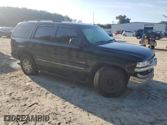 2003 Chevrolet Tahoe LT with VIN 1GNEC13Z93J171106, listed as a Copart auction lot 80452125 with 330,805 mi miles and Salvage title. Bid and sale history available at DreamBid. Image 4.