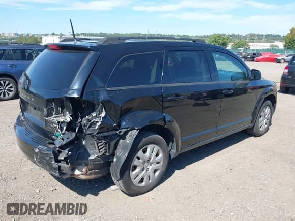 2019 Dodge Journey SE Value with VIN 3C4PDCAB9KT872056, listed as a IAAI auction lot 43206303 with 96,372 mi miles and . Bid and sale history available at DreamBid. Image 4.