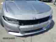 2015 Dodge Charger SE with VIN 2C3CDXBG8FH837060, listed as a IAAI auction lot 43397005 with 102,616 mi miles and . Bid and sale history available at DreamBid. Image 6.