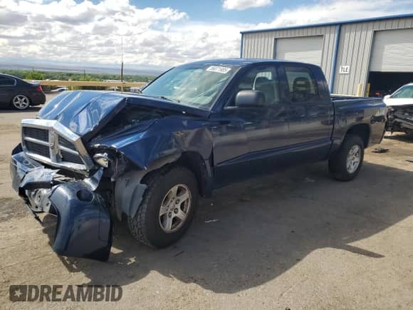 2006 Dodge Dakota SLT with VIN 1D7HW48K26S704816, listed as a Copart auction lot 56071985 with 105,189 mi miles and Salvage title. Bid and sale history available at DreamBid. Image 1.