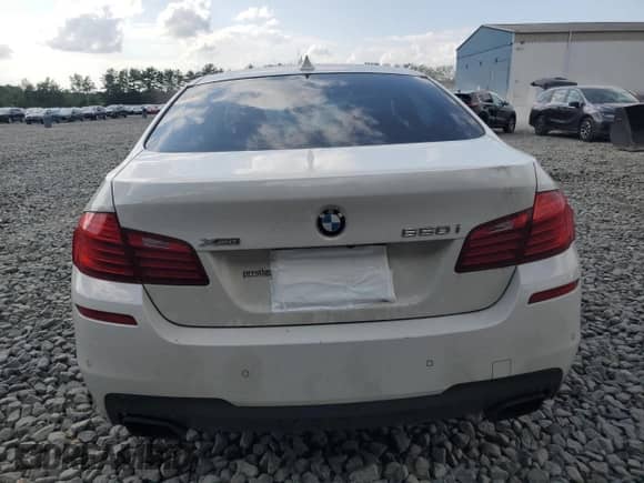 2016 BMW 5 Series 550i xDrive with VIN WBAKP9C55GD981149, listed as a Copart auction lot 65976265 with 121,838 mi miles and Salvage title. Bid and sale history available at DreamBid. Image 6.