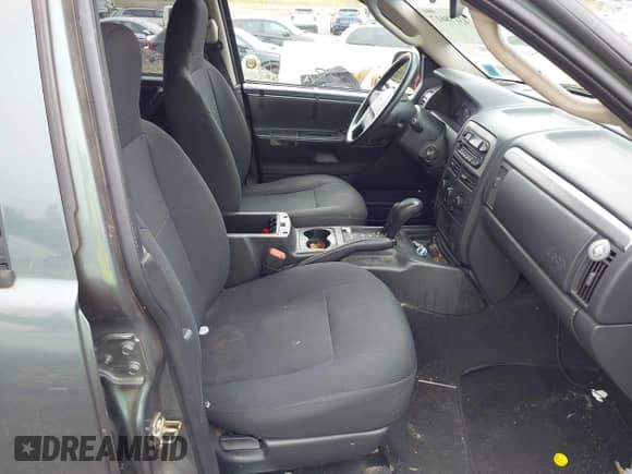 2003 Jeep Grand Cherokee Laredo with VIN 1J4GW48S23C610697, listed as a IAAI auction lot 43178617 with 227,331 mi miles and . Bid and sale history available at DreamBid. Image 5.