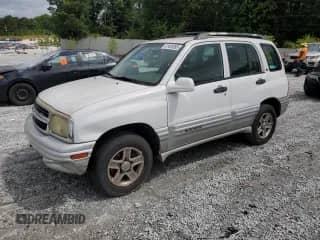 2002 Chevrolet Tracker LT с VIN 2CNBJ634126907949, выставлен на аукционе Copart как лот 61406895 с пробегом 218 423 миль миль и Чистый • Clean title. История ставок и продаж доступна на DreamBid. Изображение 1.