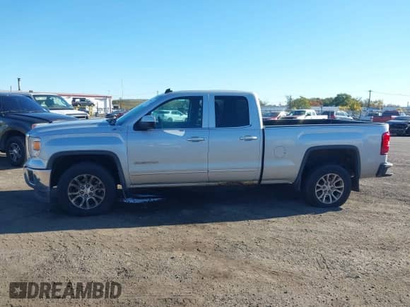 2014 GMC Sierra 1500 SLE with VIN 1GTV2UEC1EZ277382, listed as a IAAI auction lot 43487639 with 152,609 mi miles and . Bid and sale history available at DreamBid. Image 14.