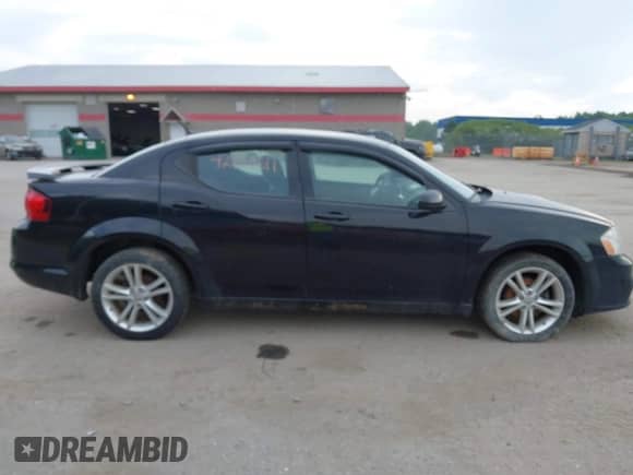 2012 Dodge Avenger SXT Plus with VIN 1C3CDZEG1CN121868, listed as a IAAI auction lot 42940511 with 139,985 mi miles and . Bid and sale history available at DreamBid. Image 14.