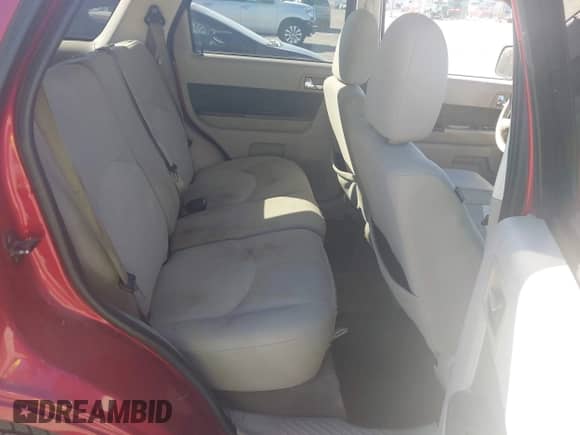 2009 Mercury Mariner with VIN 4M2CU81G79KJ00684, listed as a IAAI auction lot 43475086 with 241,545 mi miles and . Bid and sale history available at DreamBid. Image 8.