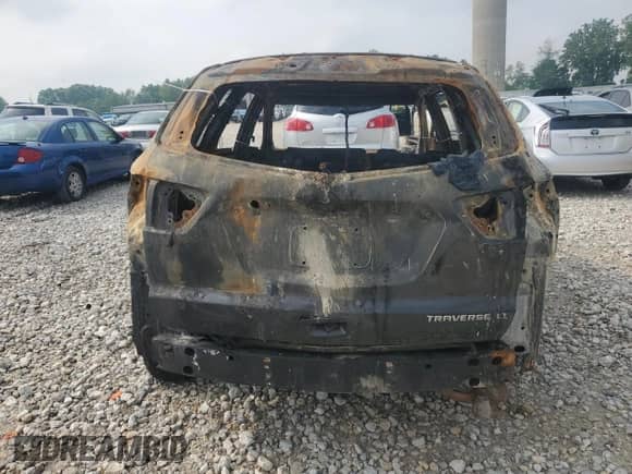 2015 Chevrolet Traverse LT с VIN 1GNKVGKDXFJ325784, выставлен на аукционе Copart как лот 59480385 с пробегом Не указан миль и На запчасти • Non repairable. История ставок и продаж доступна на DreamBid. Изображение 6.