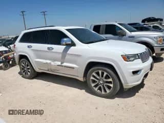 2017 Jeep Grand Cherokee Overland with VIN 1C4RJECG7HC804686, listed as a Copart auction lot 61665785 with 78,013 mi miles and Salvage title. Bid and sale history available at DreamBid. Image 1.