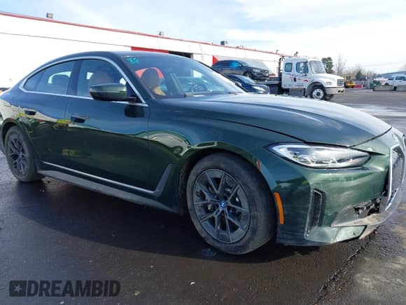 2023 BMW i4 eDrive40 with VIN WBY73AW02PFN89450, listed as a IAAI auction lot 41450499 with 15,611 mi miles and . Bid and sale history available at DreamBid. Image 1.