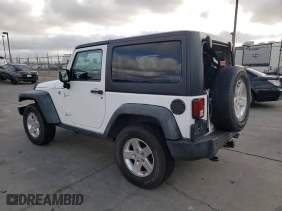 2013 Jeep Wrangler Sport with VIN 1C4AJWAG0DL636843, listed as a Copart auction lot 80034815 with 113,605 mi miles and Salvage title. Bid and sale history available at DreamBid. Image 2.