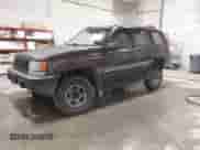 1993 Jeep Grand Cherokee with VIN 1J4GZ68S6PC579995, listed as a IAAI auction lot 43282637 with 172,681 mi miles and . Bid and sale history available at DreamBid. Image 2.