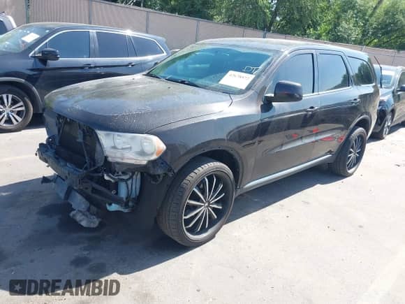 2013 Dodge Durango SXT with VIN 1C4RDHAG4DC552529, listed as a IAAI auction lot 42678572 with 126,428 mi miles and . Bid and sale history available at DreamBid. Image 2.