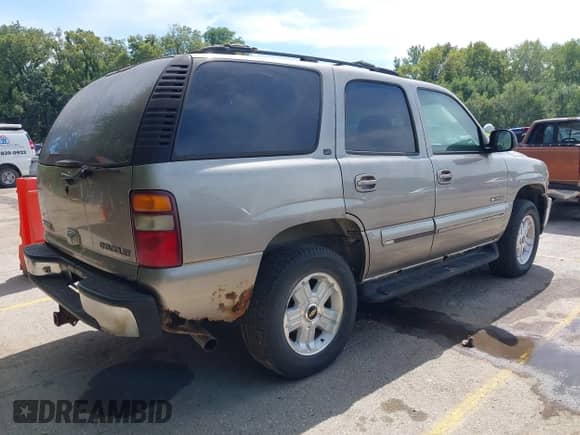 2002 Chevrolet Tahoe Z71 with VIN 1GNEK13Z02R225394, listed as a IAAI auction lot 43039699 with Not provided miles and . Bid and sale history available at DreamBid. Image 4.